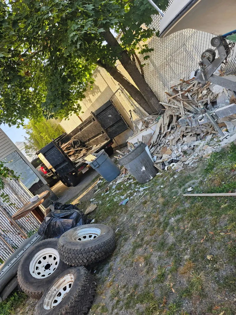 Demolition debris and old tires hauled away from a residential property near Barnstable