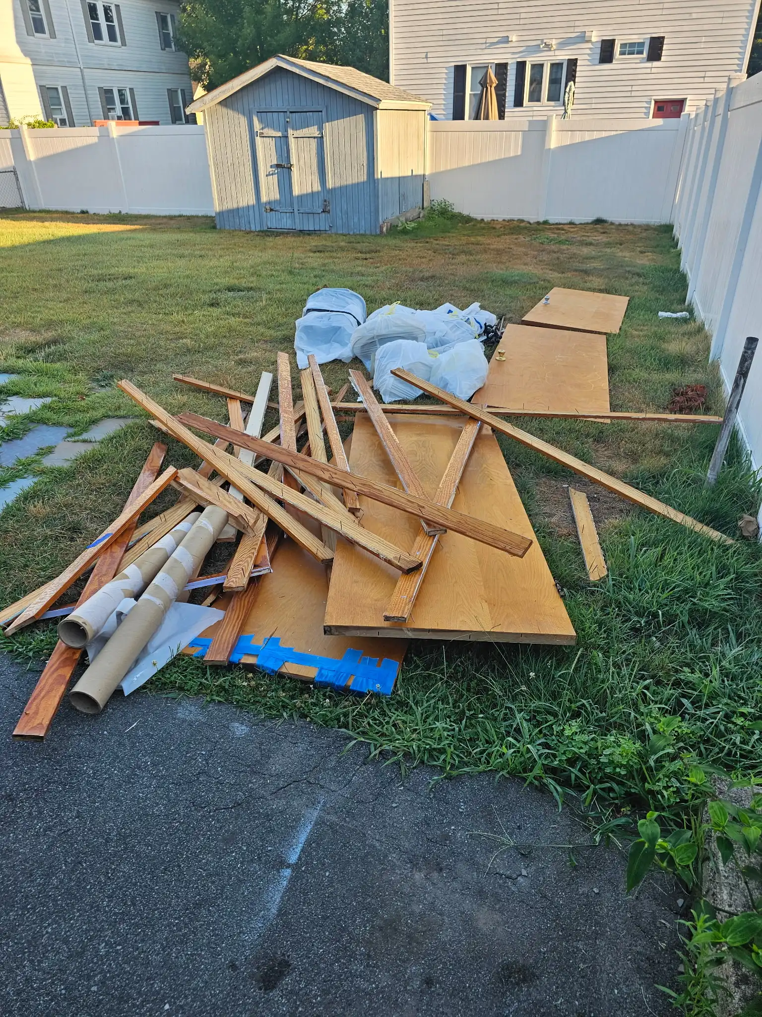 Construction debris being picked up curbside in South Coast MA